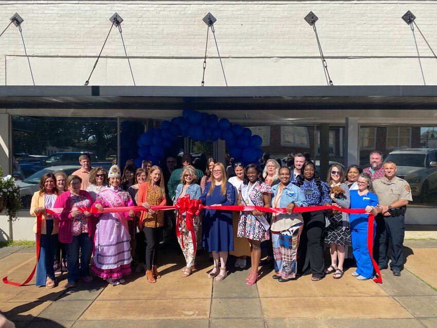Health Connect America celebrated their grand opening with a ribbon cutting ceremony last Thursday on the Square. Several community members and HCA staff gathered in support.